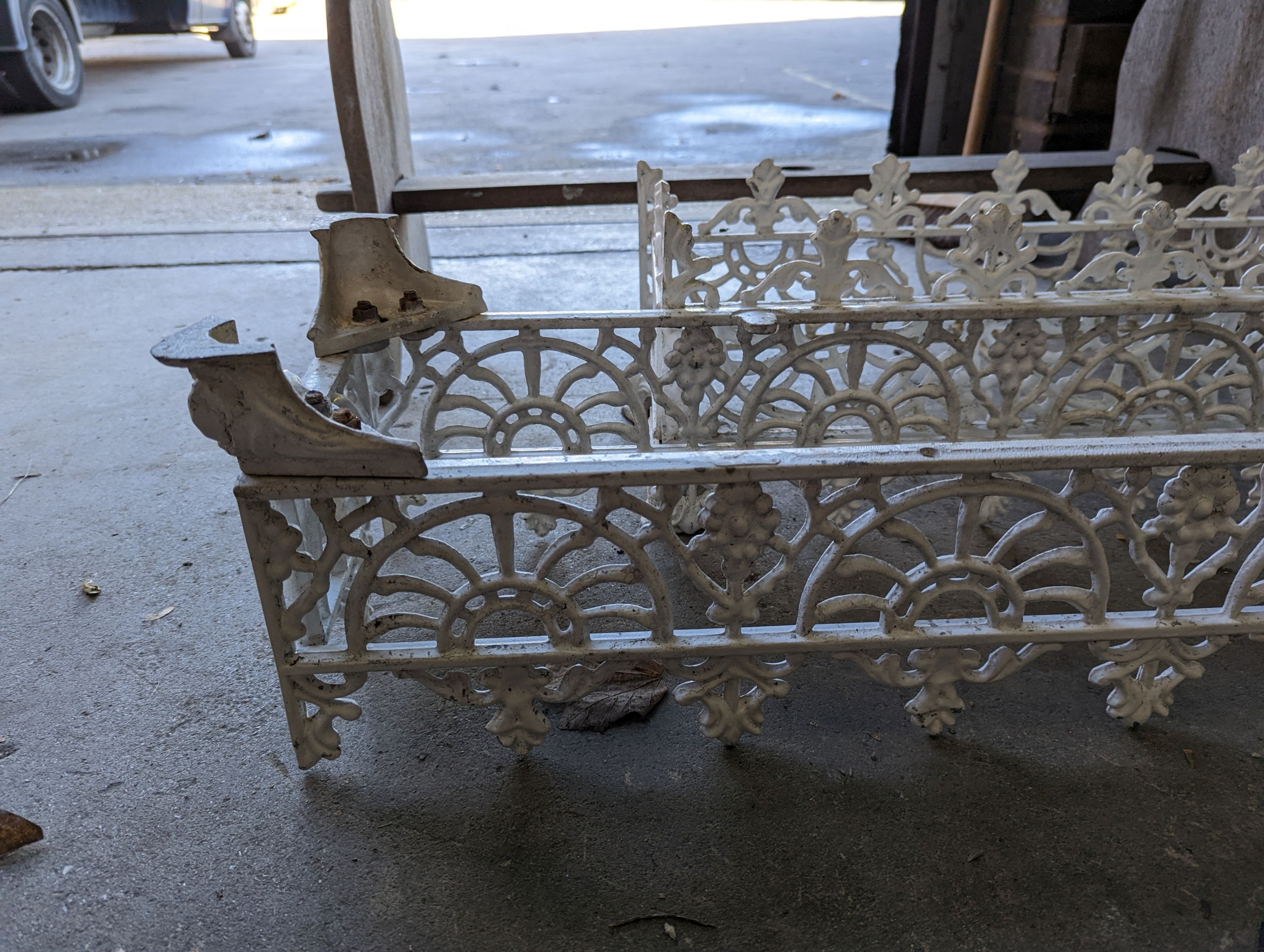 A pair of rectangular Victorian style painted metal garden planter frames (no bases), width 88cm, depth 22cm, height 23cm